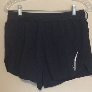 Nike 4” split leg running shorts.